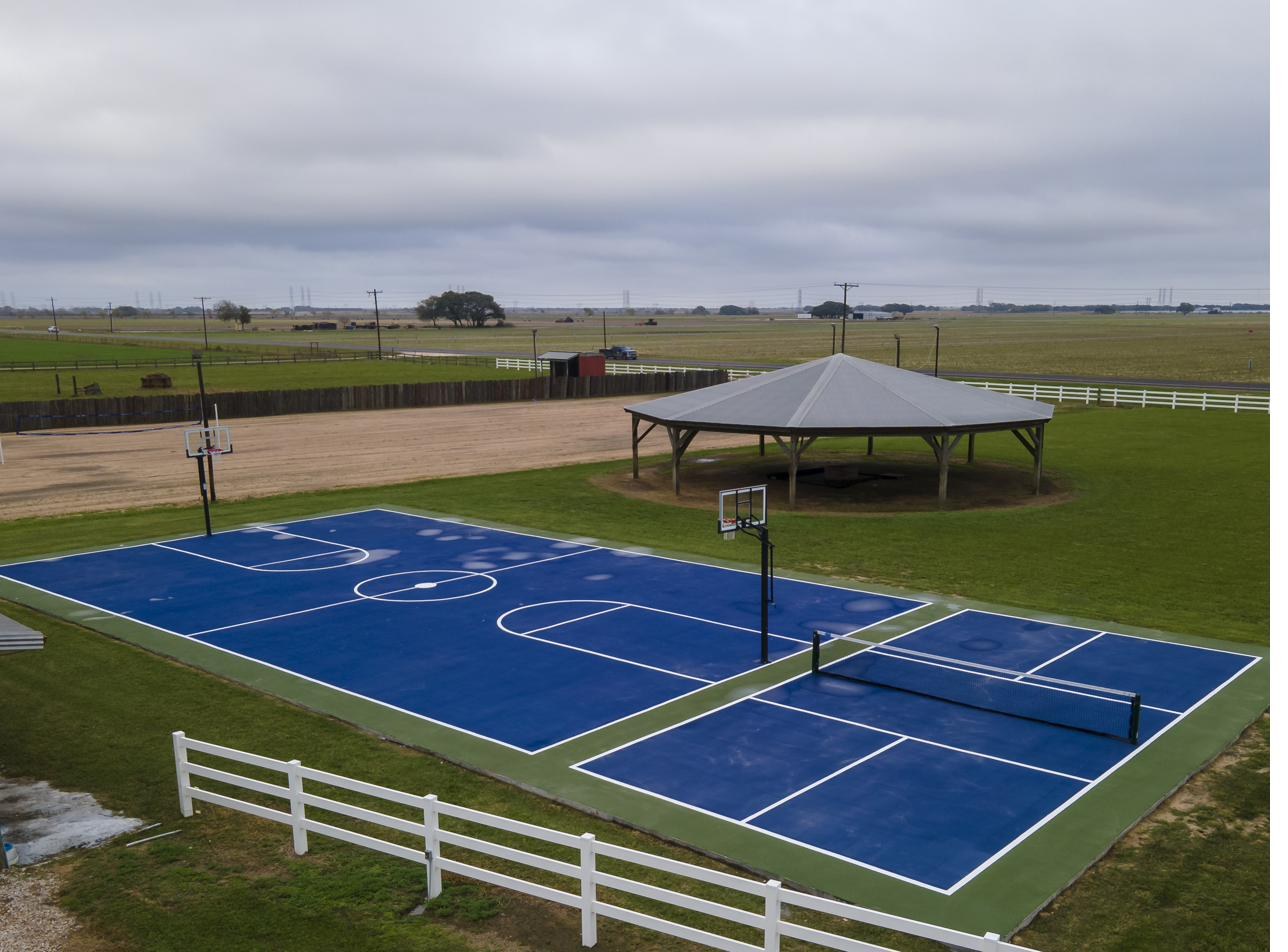 Blue outdoor basketball court