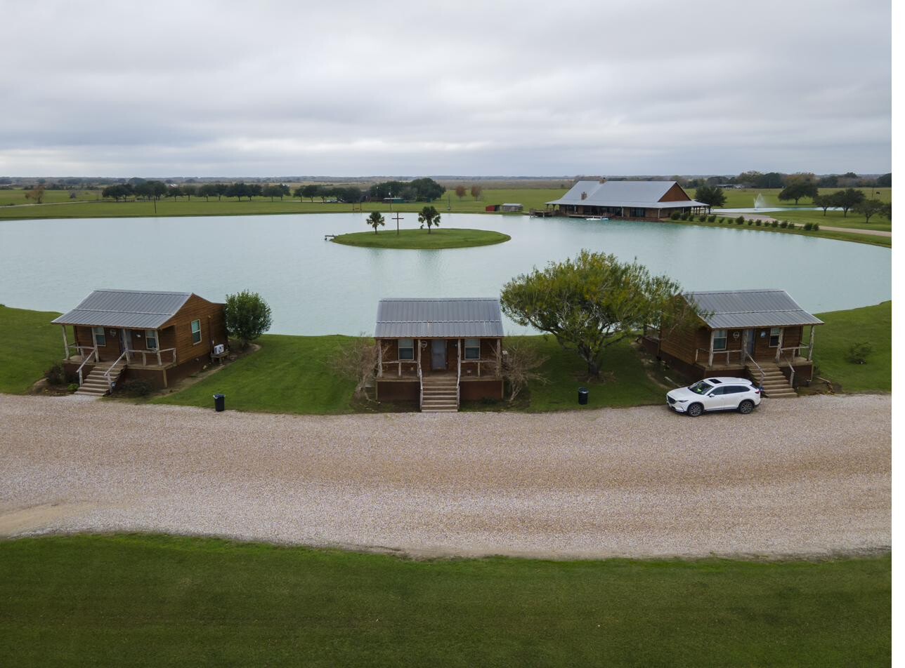 Cabins on the water's edge from above