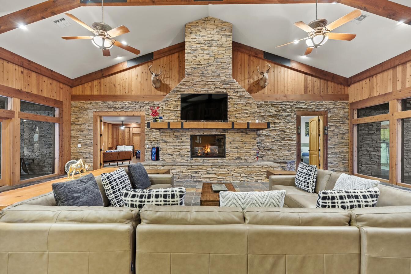 Main Lodge living room with stone fireplace