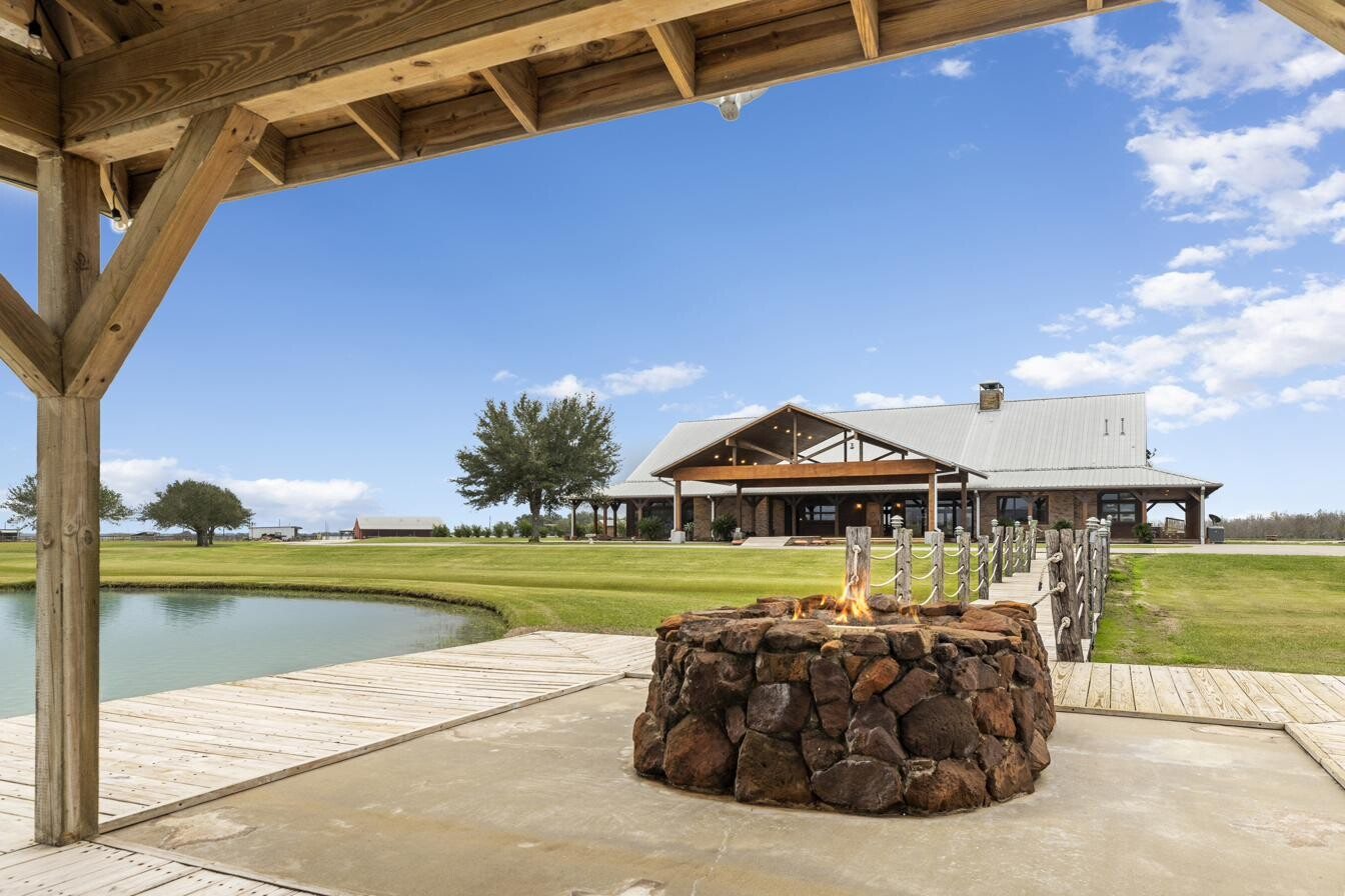 Fire pit by the pond in front of the Main Lodge